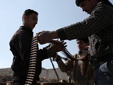 Suicide blast kills 23 rebel fighters, injures dozens in Syria near Jordan border