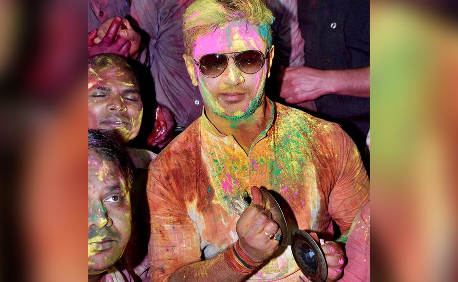 LJP MP Chirag Paswan celebrates Holi with his party workers in Patna on Tuesday. PTI Photo