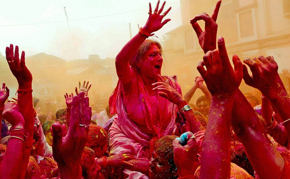 BJP candidate of Howrah North Constituency Rupa Ganguly celebrate Holi with party workers during her election campaign at Howrah district of West Bengal on Thursday ahead of upcoming State Assembly election. PTI Photo