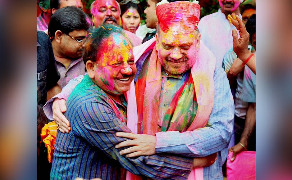 BJP National President Amit Shah and Minister for Science and Technology and Earth Sciences Harsh Vardhan during Holi celebrations in New Delhi on Thursday. PTI Photo