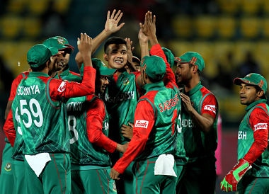 Bangladesh celebrate their win over Oman. AFP