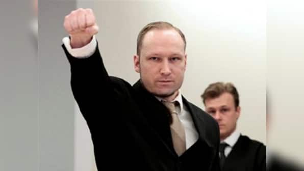 Norwegian terrorist Breivik, accused of slaughtering 77 people, makes Nazi salute in court