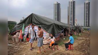 Over 100 million children 'left behind' in Chinese villages, as urban migration takes its toll