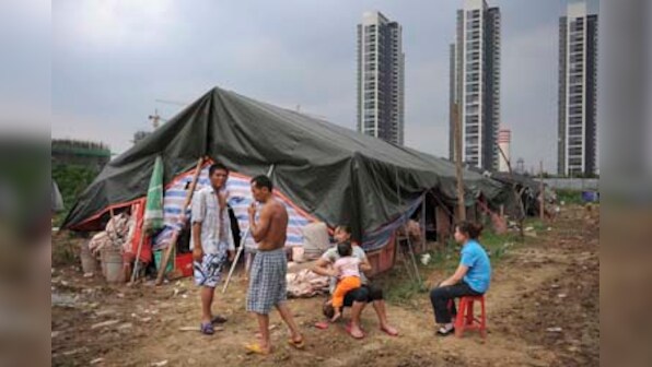 Over 100 million children 'left behind' in Chinese villages, as urban migration takes its toll