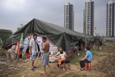 Over 100 million children 'left behind' in Chinese villages, as urban migration takes its toll Over 100 million children 'left behind' in Chinese villages, as urban migration takes its toll