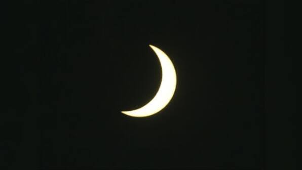 The best kind of cover-up: Indonesians erupt in cheers, prayers as total eclipse darkens skies