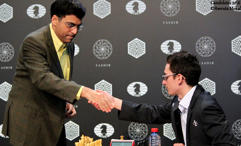 Candidates Chess: Anand settles for a draw despite having Caruana on mat; stays in joint lead Candidates Chess: Anand settles for a draw despite having Caruana on mat; stays in joint lead