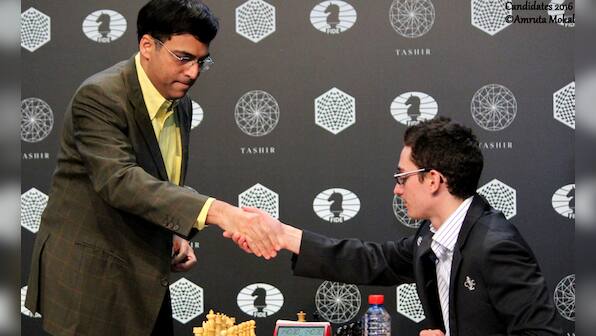 Candidates Chess: Anand settles for a draw despite having Caruana on mat; stays in joint lead
