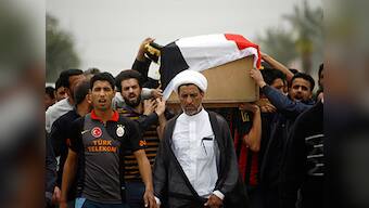 Rest in peace: Iraq buries young victims of football pitch bomb carnage