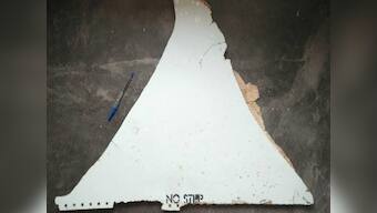 Suspected MH370 debris handed to Malaysian experts
