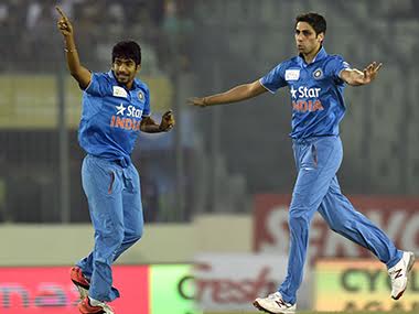Ashish Nehra and Jasprit Bumrah. AFP