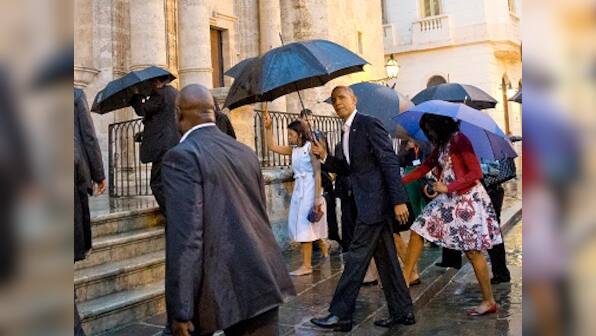 'Historic visit, historic opportunity': Obama arrives in Cuba, becomes first US president to do so in 88 years