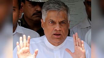 Ranil Wickremesinghe takes oath as Sri Lanka's prime minister at Presidential Secretariat in Colombo