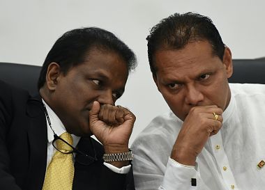 Sri Lanka Cricket President Thilanga Sumathipala (L) with Sports Minister Dayasiri Jayasekera. AFP