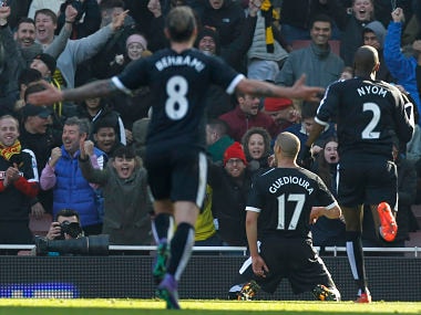 Watford celebrate after scoring against Arsenal in the FA Cup. AFP