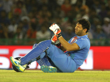 ICC World T20: What the heck was an injured Yuvraj Singh doing limping around in the middle? ICC World T20: What the heck was an injured Yuvraj Singh doing limping around in the middle?
