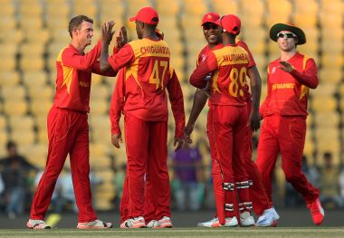Zimbabwe celebrate during WT20 qualifier against Scotland. AFP