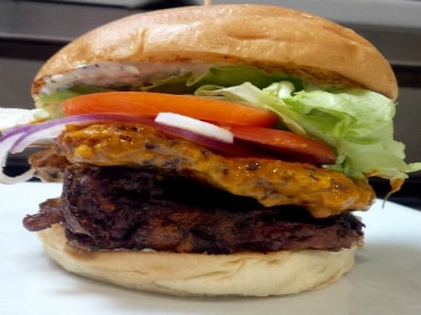 'The Minister of National Deliciousness' burger. TWITTER / @TheCannibalCafe