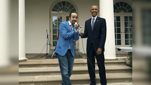 Watch: A sombre-looking Obama dropping the beat to Miranda's freestyle rap
