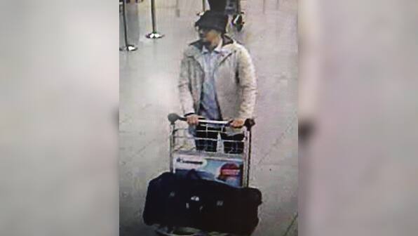 Belgian police issue wanted notice for Brussels attacks suspect - bespectacled, with a goatee beard