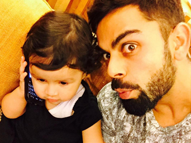Cuteness overload: Virat Kohli poses with baby Dhoni ahead of India-West Indies World T20 semi-final Cuteness overload: Virat Kohli poses with baby Dhoni ahead of India-West Indies World T20 semi-final