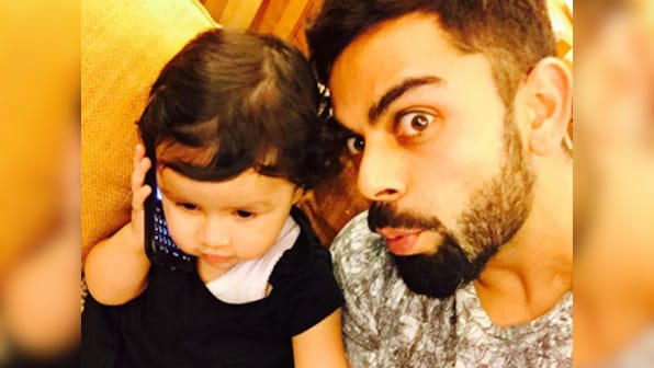 Cuteness overload: Virat Kohli poses with baby Dhoni ahead of India-West Indies World T20 semi-final