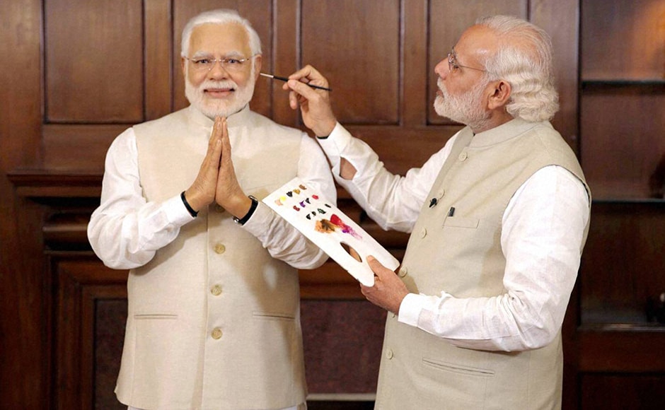 Prime Minster Narendra Modi with his wax statue due to be placed at London’s Madame Tussauds museum, in New Delhi. Three of his wax statues have been installed in Singapore, Hong Kong and Bangkok and one of them will be put up in London in the next eight days. PTI Prime Minster Narendra Modi with his wax statue due to be placed at London’s Madame Tussauds museum, in New Delhi. Three of his wax statues have been installed in Singapore, Hong Kong and Bangkok and one of them will be put up in London in the next eight days. PTI