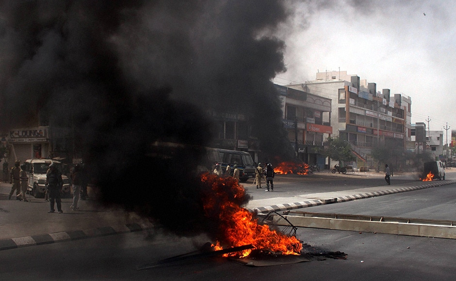 Members of the Patidar community burnt vehicles during their Members of the Patidar community burnt vehicles during their