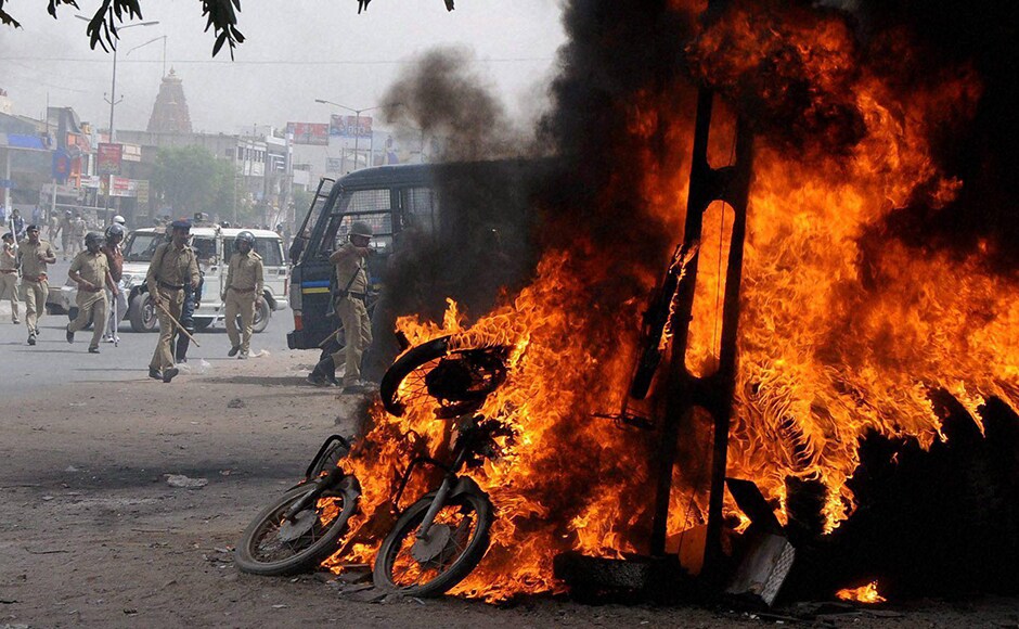 Members of the Patidar community burnt vehicles during their Members of the Patidar community burnt vehicles during their