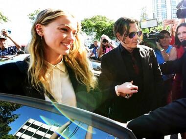 'War on terrier' ends: Amber Heard pleads guilty, avoids jail time in Australian dog smuggling case