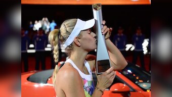Angelique Kerber defends Stuttgart title, drives home with another Porsche
