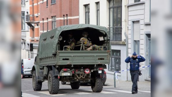 Paris attacks suspect Mohamed Abrini arrested in Brussels as accomplice Salah Abdeslam awaits extradition to France