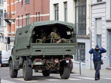 Paris attacks suspect Mohamed Abrini arrested in Brussels as accomplice Salah Abdeslam awaits extradition to France