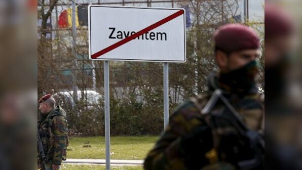 Brussels attacks: Video of 'man in the hat' fleeing after airport bombings released