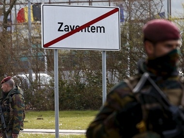 Belgian soldiers stand guard on a road leading to Zaventem airport. File photo. Reuters