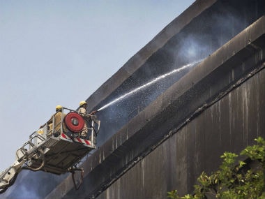 Firefighters try to extinguish a massive fire at the National Museum of Natural History in New Delhi. PTI