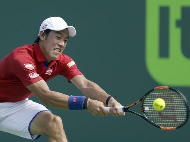 Kei Nishikori returns to Gael Monfils during the Miami Open. AP