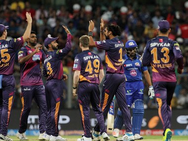 Rising Pune Supergiants players celebrates the wicket of Mumbai Indians captain Rohit Sharma. Sportzpics