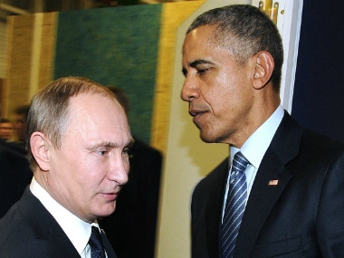Russian President Vladimir Putin (L) with US President Barack Obama on the sidelines of the UN conference on climate change in November 2015