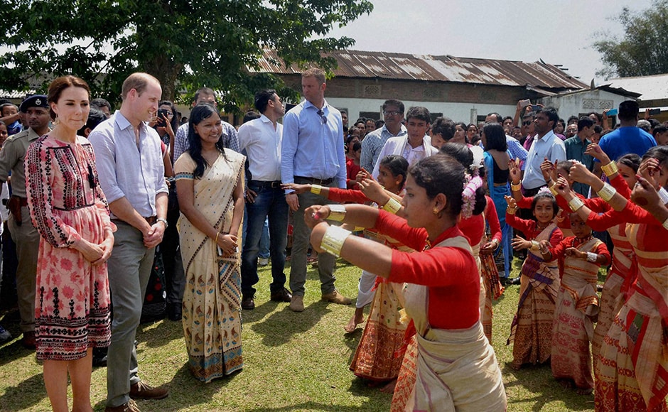 Prince William and Kate are welcomed by village women during their visit to Panbari Model village near Kaziranga. PTI Photo Prince William and Kate are welcomed by village women during their visit to Panbari Model village near Kaziranga. PTI Photo