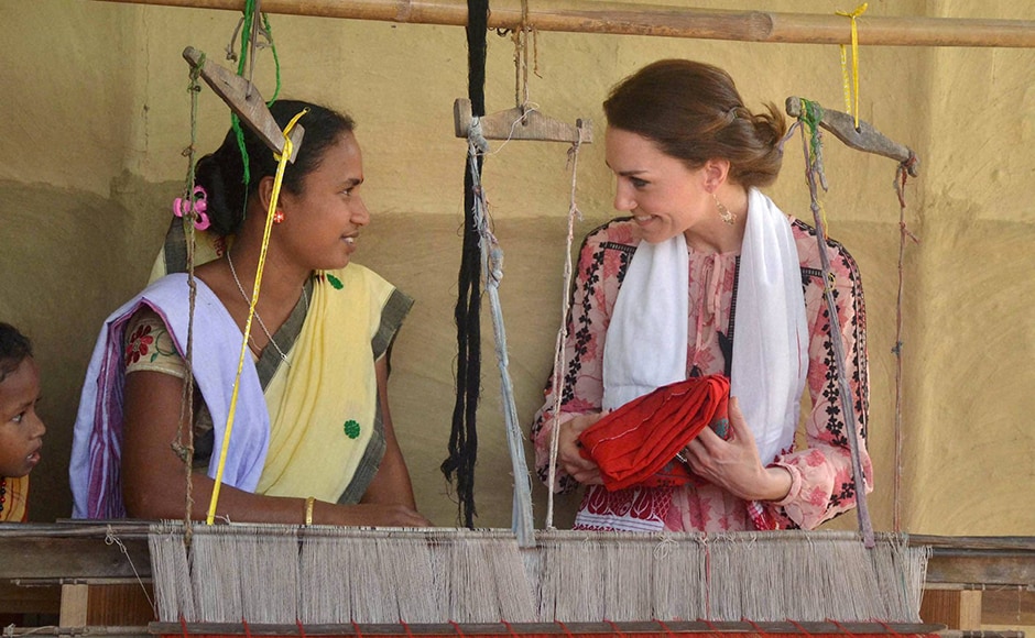 Kate receives a traditional cloth as a gift from a weaver during a visit to Panbari Model village near Kaziranga, Assam on Wednesday. PTI Photo Kate receives a traditional cloth as a gift from a weaver during a visit to Panbari Model village near Kaziranga, Assam on Wednesday. PTI Photo