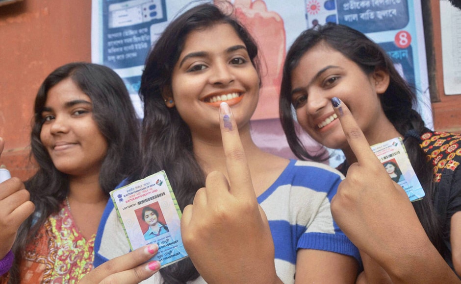 Voters in Silchar show their inked fingers after casting vote on Monday. PTI Voters in Silchar show their inked fingers after casting vote on Monday. PTI