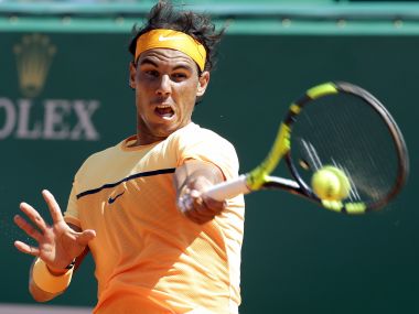 Rafael Nadal plays a return to Stanislas Wawrinka during their quarterfinal match at Monte Carlo. AP