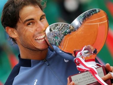 Rafael Nadal holds his trophy during the awarding ceremony at the Monte-Carlo ATP Masters. AFP