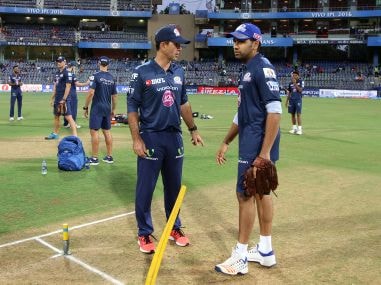 Mumbai Indians captain Rohit Sharma speaks with coach Ricky Ponting. BCCI