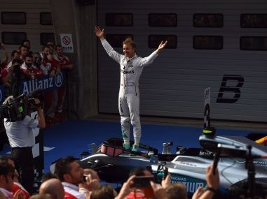 Mercedes' Nico Rosberg celebrates after winning the Formula One Chinese Grand Prix. AFP