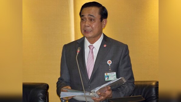 Thailand’s new cabinet sworn in after five years of military rule; power still in hands of military allies