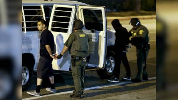 Twenty arrested as Trump rally protest turns violent in California