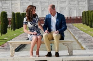 Britain's Prince William, along with his wife, Kate, the Duchess of Cambridge, talk to each other as they pose in front of the Taj Mahal in Agra on Saturday. PTI<br /> Britain's Prince William, along with his wife, Kate, the Duchess of Cambridge, talk to each other as they pose in front of the Taj Mahal in Agra on Saturday. PTI<br />
