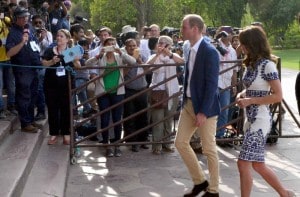 Onlookers click pictures as Britain's Prince William, along with his wife, Kate, the Duchess of Cambridge, enter the Taj Mahal in Agra on Saturday. PTI<br /> Onlookers click pictures as Britain's Prince William, along with his wife, Kate, the Duchess of Cambridge, enter the Taj Mahal in Agra on Saturday. PTI<br />